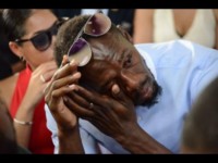 Usain Bolt in tears at Germaine Mason’s funeral