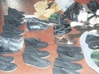 Cops lock down fake Clarks shoe factory; nine men arrested