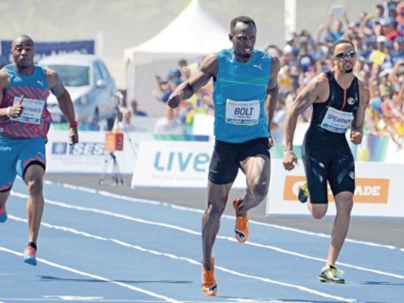 Bolt eases to first 100m win of 2014 in 10.06secs