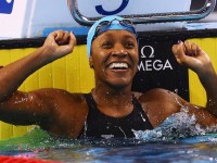 Jamaican swimmer Alia Atkinson becomes first black woman to win world title, ties world record in 100m breaststroke