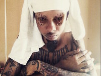 CRAZY: Dancehall Artist Checkdhat Pierce And Tattoo Eyes Plus Bleach Skin