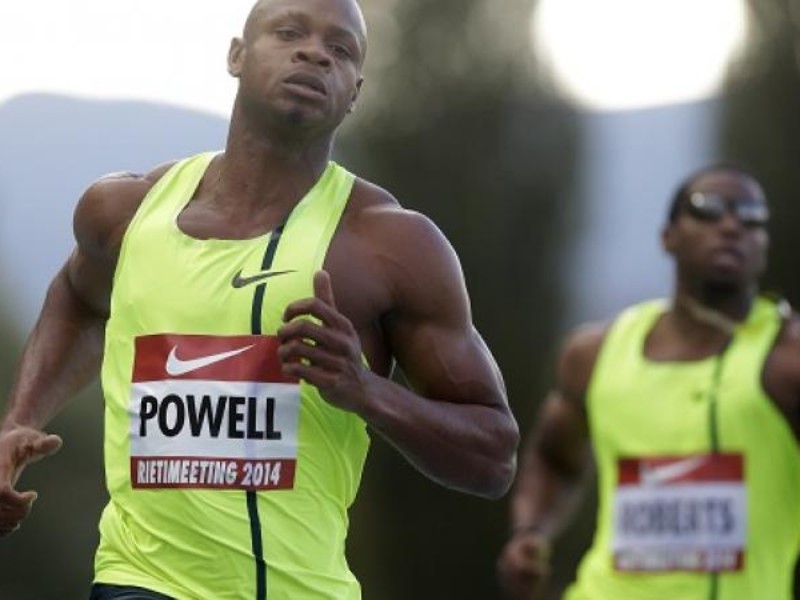 Asafa Powell takes 100m title