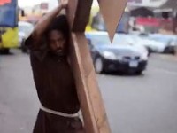 DANCEHALL ARTISTE HANGS HIMSELF ON CROSS IN KINGSTON CLAIMING TO BE THE SAVIOR (PICTURE & VIDEO)