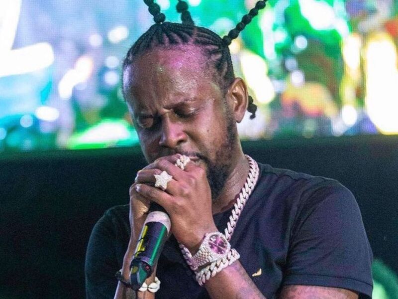 Popcaan Rescued By Entourage After Female Fans Pulled Him Off Stage (VIDEO)